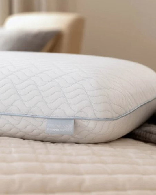 Serenity by Tempur-Pedic cooling pillow front view, Tempur-Pedic memory foam pillow with breathable cover, Standard size cooling pillow with soft-knit fabric, Side view of cooling foam pillow for all sleep types, Zippered washable cover on Tempur-Pedic Serenity pillow