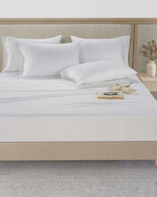 Hotel Signature 800 thread count sheet set on bed, close-up of cotton sateen weave, fitted sheet with deep pocket on mattress, wrinkle-resistant luxury bed sheets, 6-piece cotton sheet set in white