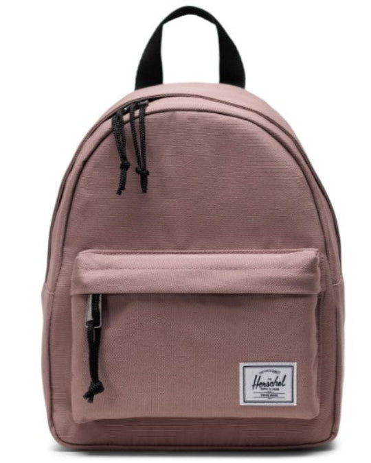 Herschel Classic Mini Backpack in Ash Rose front view, Eco-friendly mini backpack made from recycled materials, Compact pink Herschel backpack with front pocket, Adjustable strap detail on Herschel Ash Rose mini bag