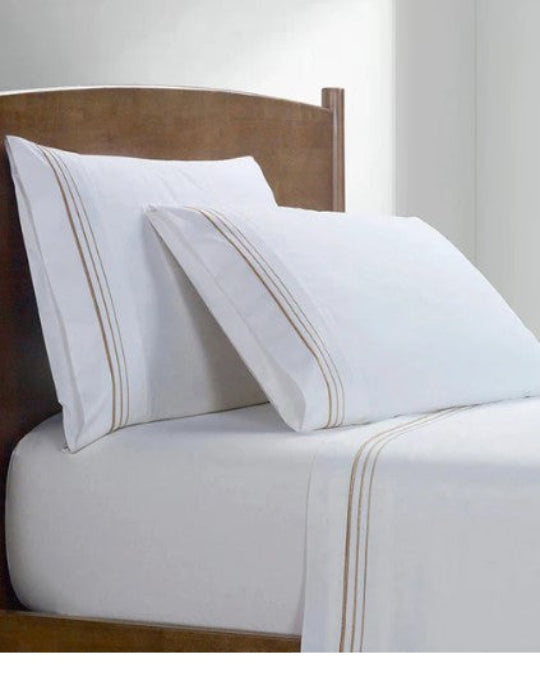 ueen-size white cotton sheet set with embroidered border, Hotel-style 350TC embroidered sheet set on bed, Close-up of embroidered line detail on queen pillowcase, Soft white sateen flat and fitted sheets with pillowcases, HiEnd Accents queen bedding with classic embroidery design